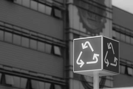 Shallow depth of field (selective focus) details with a recycle sign near a recycling facility at a shopping centre.の写真素材