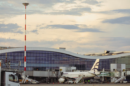Otopeni, Romania - June 26, 2022: Aegean airline plane on the Henri Coanda Airport.のeditorial素材