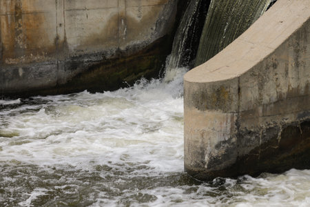 Water flowing through a sluice on a river.の写真素材