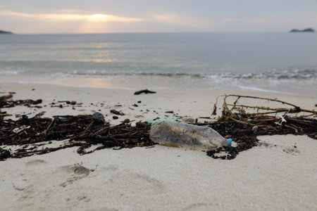 Plastic and wood waste washed ashore on the Golden Beach in Thassos after a powerful storm on a...