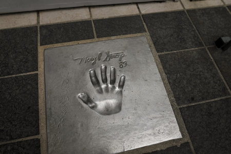 Cannes, France - April 20, 2022: Details with hand prints of famous actors in front of the Cannes Casino, where the Cannes film festival takes place.のeditorial素材