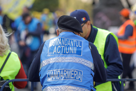 Bucharest, Romania - October 20, 2022: Romanian jandarmi (riot police) commander during a protest.のeditorial素材
