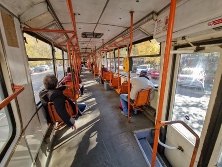Bucharest, Romania - October 28, 2022: people using an old tram in Bucharest.のeditorial素材