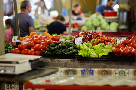Shallow depth of field (selective focus) details with vegetables stand in Obor market in Bucharest, Romania.の写真素材