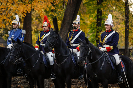 Bucharest, Romania - November 1, 2022: Mounted Romanian Jandarmi (horse riders from the Romanian Gendarmerie) in ceremonial and parade uniforms.のeditorial素材