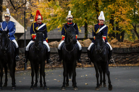 Bucharest, Romania - November 1, 2022: Mounted Romanian Jandarmi (horse riders from the Romanian Gendarmerie) in ceremonial and parade uniforms.のeditorial素材