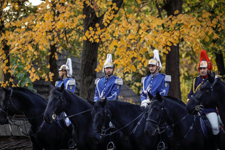 Bucharest, Romania - November 1, 2022: Mounted Romanian Jandarmi (horse riders from the Romanian Gendarmerie) in ceremonial and parade uniforms.のeditorial素材