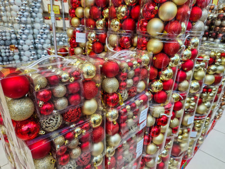 Bucharest, Romania - October 30, 2022: Shallow depth of field (selective focus) details with Christmas decorations (bulbs) for sale in a specialised hipermarket.のeditorial素材