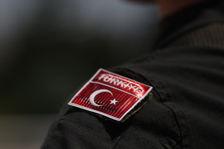 Details with the Turkish flag on the uniform of a Turkish soldierの写真素材