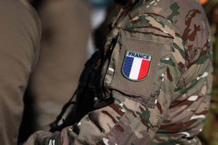 French soldier in combat gear during a multinational exercise.の写真素材