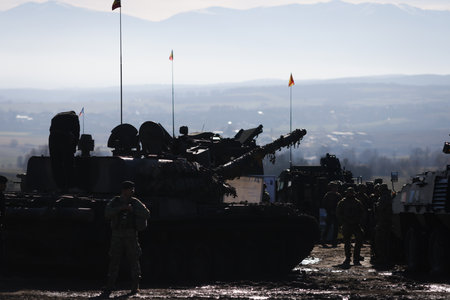 Soldiers and tanks during a NATO Multinational Exercise.