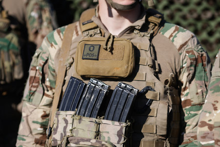French soldier in combat gear during a NATo Multinational Exercise.