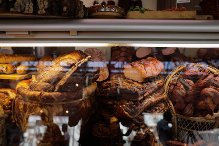 Various Romanian traditional smoked meat cuts for sale.の写真素材