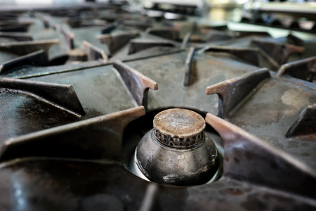 Details with the professional gas burner inside a restaurant kitchen.の写真素材