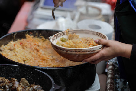 Details with traditional Romanian sarmale or stuffed cabbage rolls in a farmers market.の写真素材
