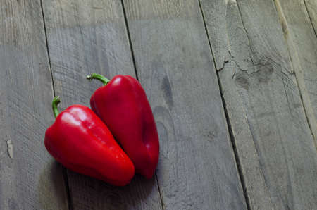 red Pepper on wooden background red papricaの写真素材