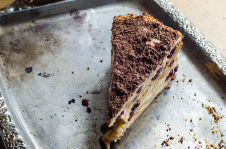 Tasty homemade pie with cherries on metal plate
