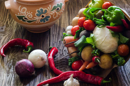 vegetables bouquet on wooden background fresh colourfulの写真素材