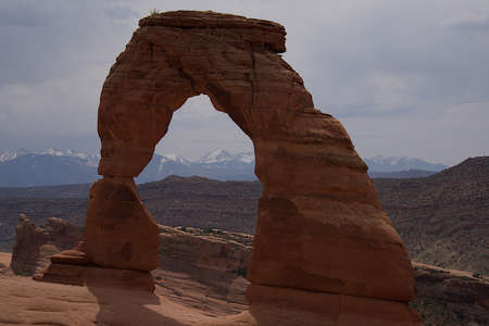 Delicate Arch in Arches National Park framing the La Sal Mountains