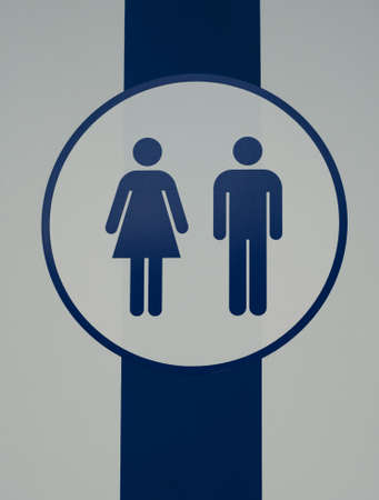Sign of public restroom for female and male. Man and woman toilet, WC. White and blue stripes backgroundの写真素材