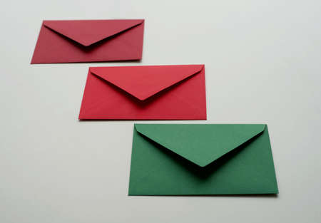 Red, green and garnet envelopes for letters. Holiday Xmas Cardsの写真素材