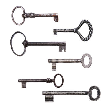 Six different old keys isolated on white