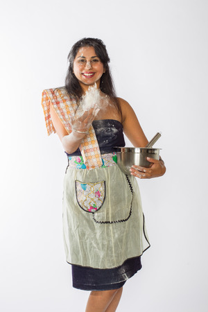 Indian Woman Tosses Flourの写真素材