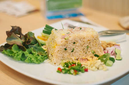 Chinese fried rice on white plateの写真素材