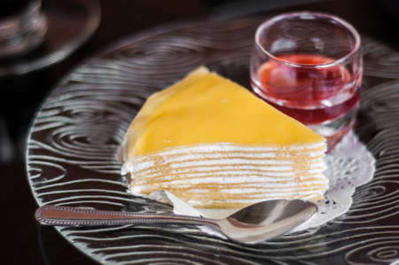 Crape cake with strawberry sauceの写真素材