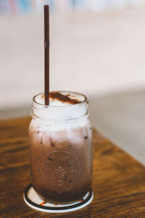 Chocolate with Ice on wooden tableの写真素材