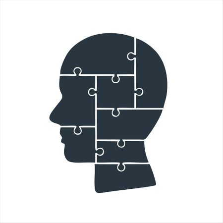 Silhouette of human head with puzzle pieces. Vector illustration.のイラスト素材