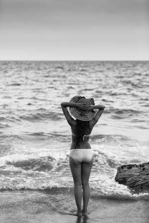 Shenzhen, Dorsal horn Beach, sunny, Bikini girl with summer hatのeditorial素材