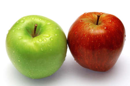 Green apple with waterdrops on its surfaceの写真素材