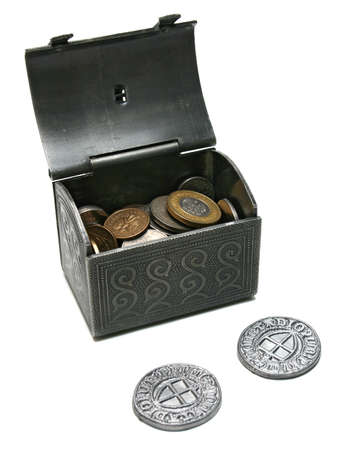Open chest with polish and estonian coins isolated on white backgroundの写真素材