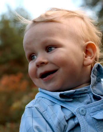 Little child enjoying an outdoor walkの写真素材