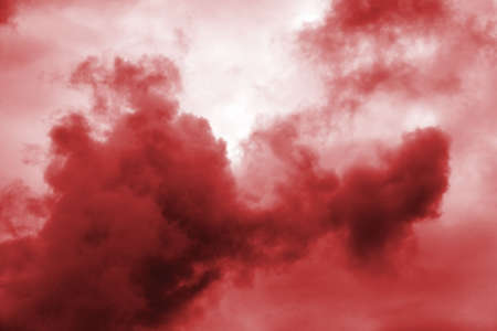 Gloomy overcast sky in bloody red tonesの写真素材