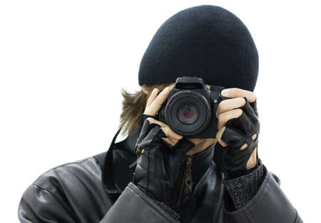 Spy photographer dressed in blackの写真素材