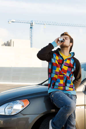 Car driver having a refreshing drink