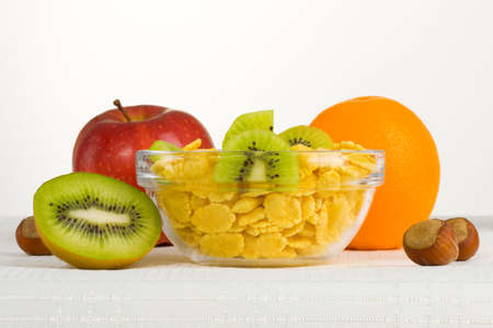 Healthy breakfast - cornflakes with fresh fruitの写真素材