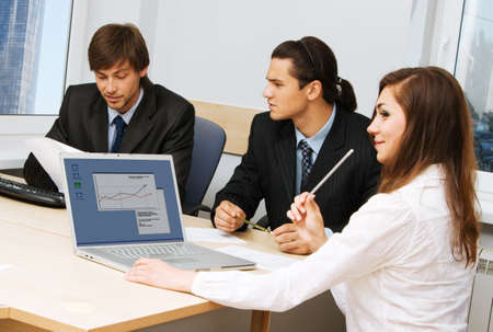 Young businesspeople having a meeting in officeの写真素材