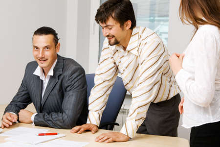 Photo of office workers having a discussionの写真素材