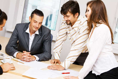 Photo of office workers having a discussionの写真素材