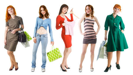 Group of young beautiful girls on shopping, isolated on white backgroundの写真素材