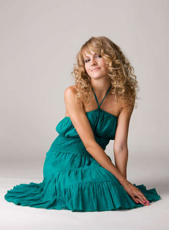 Young beautiful girl full-length studio portraitの写真素材