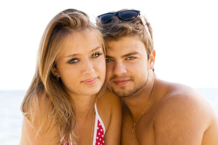 Romantic couple having fun on the seasideの写真素材