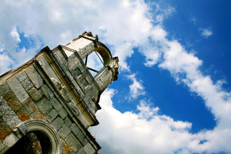 Ruins of an old church against a blue skyの写真素材