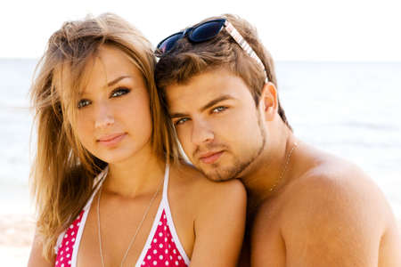 Romantic couple having fun on the seasideの写真素材