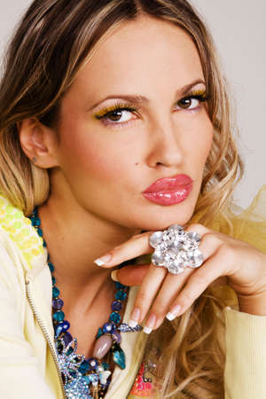 Young charming woman with luxury accessoriesの写真素材