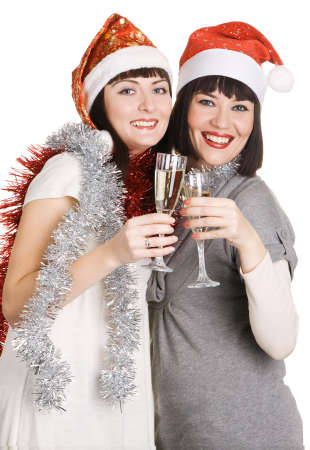 Christmas girls holding champagne glasses, isolated on white backgroundの写真素材