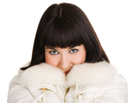 Cute Christmas girl in warm winter clothingの写真素材